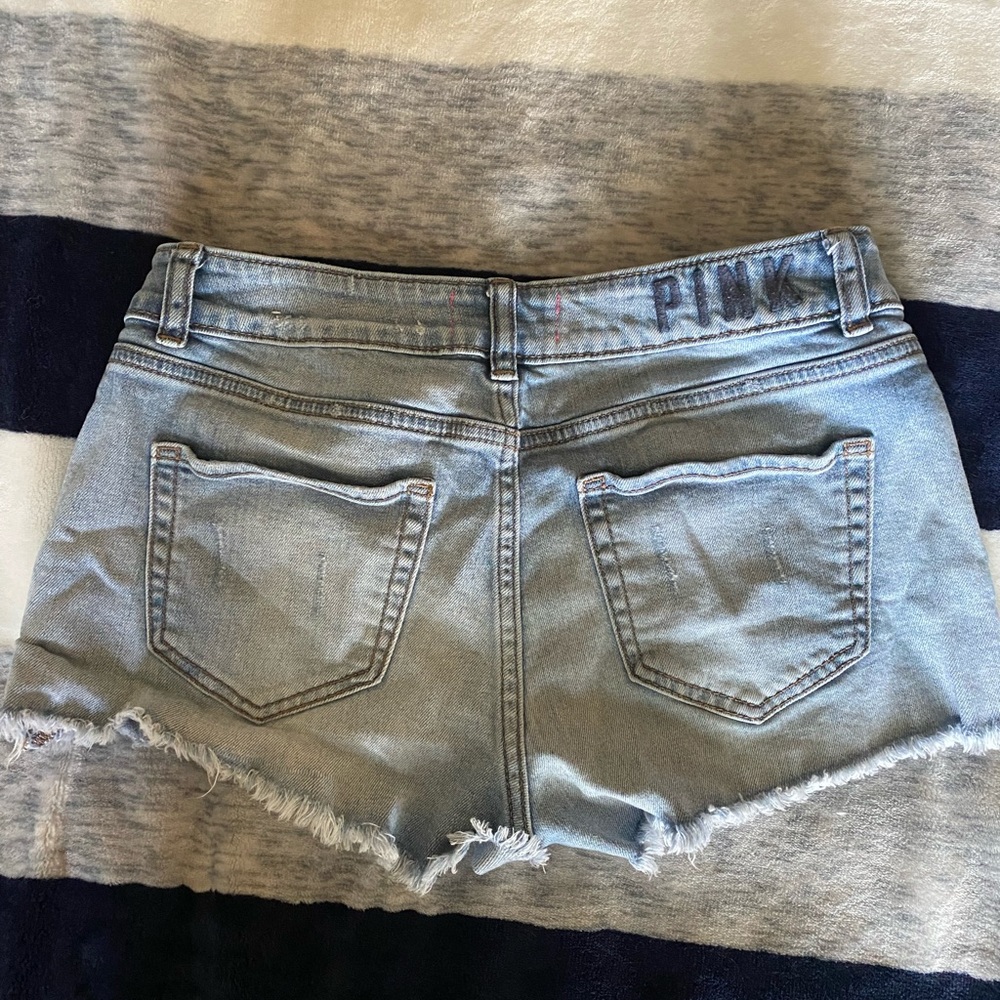 Pink jean shorts size 6.